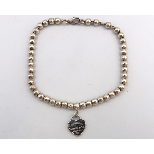 32 - A Tiffany .925 Silver Heart Bead Bracelet, 19cms Long Including the Clasp