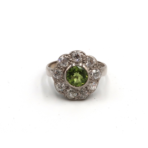 45 - An 18ct White Gold Vintage Diamond and Peridot Ring, Head Size approx. 14mm Diameter, Ring Size appr... 