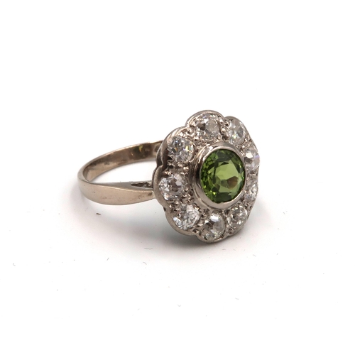 45 - An 18ct White Gold Vintage Diamond and Peridot Ring, Head Size approx. 14mm Diameter, Ring Size appr... 