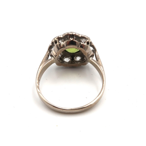 45 - An 18ct White Gold Vintage Diamond and Peridot Ring, Head Size approx. 14mm Diameter, Ring Size appr... 