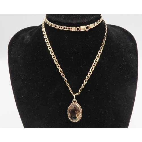 76 - A 9ct gold flat curb, cable link necklace, 10.7g, 47cm long, and a smokey quartz pendant set in 9ct ... 