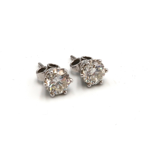 83 - A pair of diamond and 18ct white gold earrings - Estimated 1.36ct total diamond weight Estimated I/J... 