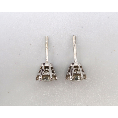 83 - A pair of diamond and 18ct white gold earrings - Estimated 1.36ct total diamond weight Estimated I/J... 