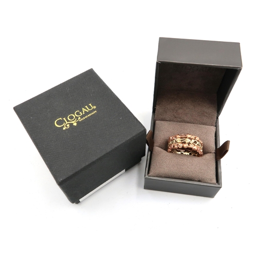 9 - A 9ct rose and yellow gold Clogau openwork decorative band ring. Size O 1/2. Weight 7.62 grams