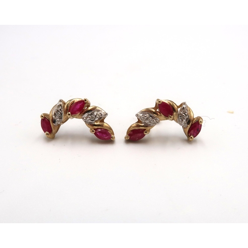 101 - A pair of ruby and diamond curved earrings. Test 14ct. Weight 2.39 grams.