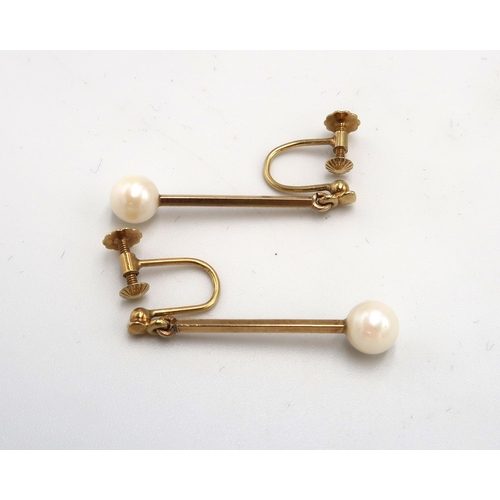 111 - A pair of cultured pearl drop earrings. Stamped 585. Weight 3.09 grams