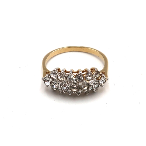 121 - A 14ct gold and cubic zircoonia triple row dress ring, size P, unmarked but testing as 14ct, 3.1g.