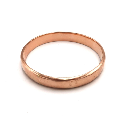 132 - A hallmarked 9ct rose D shaped gold bangle - internal diameter approx 6.6cm - weight approx 15.05 gr... 