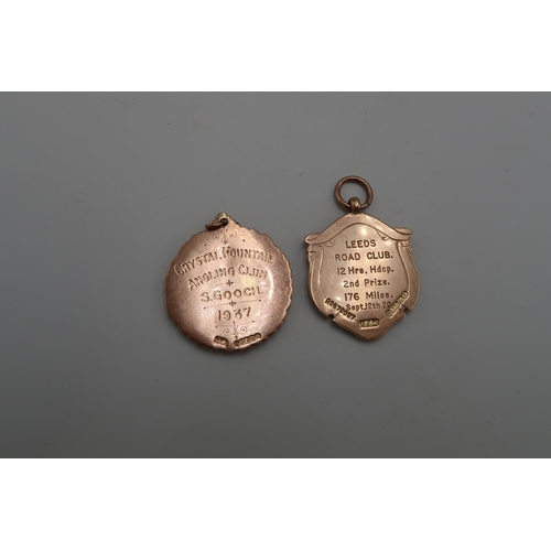 135 - Two 9ct yellow gold medals with pendant loop - the first of shield form engraved to back Leeds Road ... 