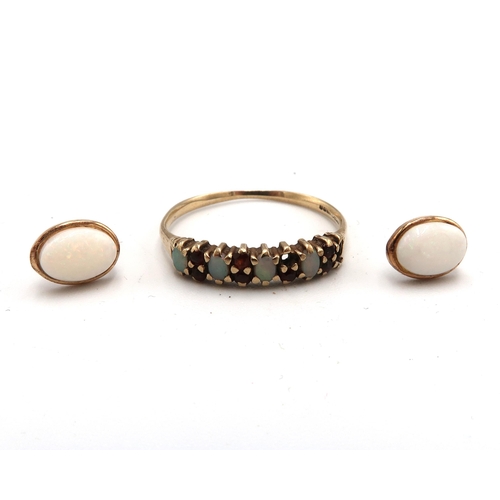 220 - A 9ct gold opal and garnet half eternity ring. Size R 1/2. Two stones missing. A pair of oval opal e... 