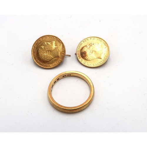 221 - A 22ct 3mm band ring. Size S 1/2. Weight 6.13 grams. Together with two half sovereign coins 1906 and... 