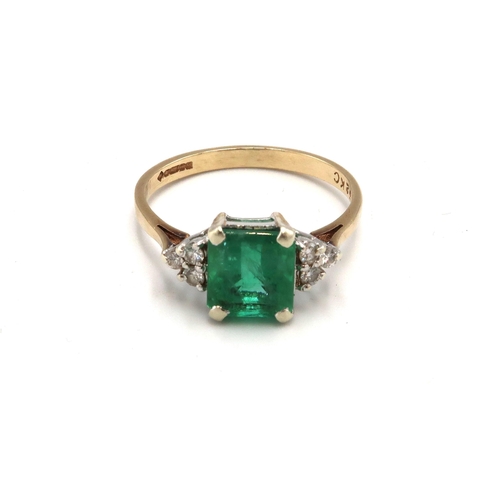 226 - A 9ct gold emerald and diamond dress ring. Emerald measuring approximately 7mm by 7.7mm. Ring size O... 