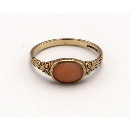 228 - A 9ct gold coral ring. Size P. Weight 1.61 grams