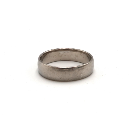 231 - A platinum 6mm band ring. Size U. Weight 6.12 grams