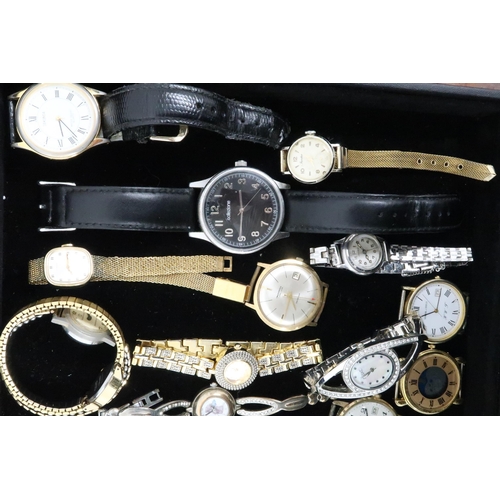 241 - A large group of costume and vintage watches, including Ingersoll, Timex, and Rotary.