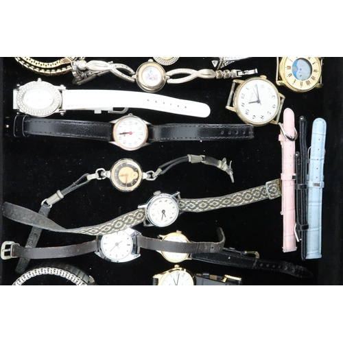 241 - A large group of costume and vintage watches, including Ingersoll, Timex, and Rotary.