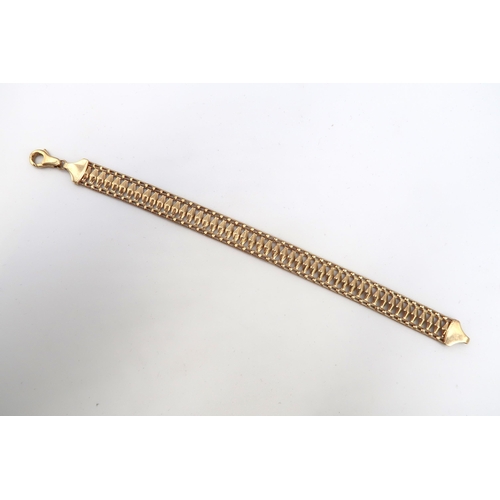 54 - A 9ct gold bracelet, set with diamond shaped panels with open gatelink border, 19.5cm long, 8.4g.