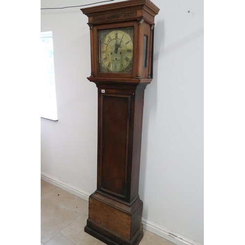 582 - An 8 day longcase clock with a square 12 inch brass dial signed Samuel Coxall Royston - in an oak ca... 