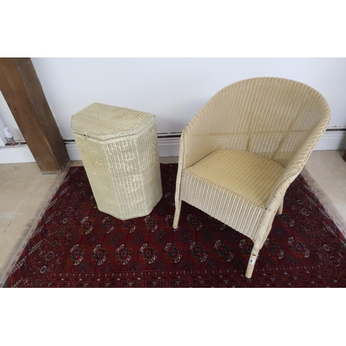 647 - A Lloyd Loom chair and linen basket