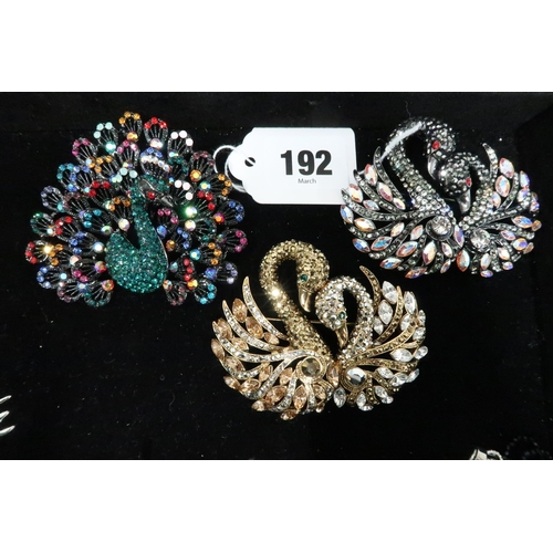 192 - A group of Butler and Wilson Designer bird themed jewellery comprising: peacock brooch, brooch model... 