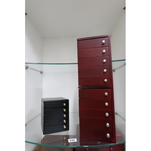 235 - A tall jewellery tower case, with ten swivel drawers, 13 by 13 by 40cm high and a smaller similar ex... 