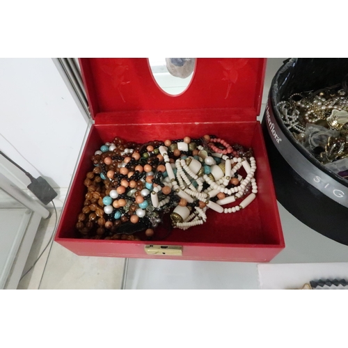 242 - A very large group of vintage and later costume jewellery including necklaces, chains, earrings, bra... 