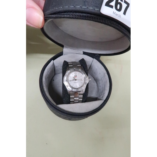 267 - A ladies Tag Professional quartz wristwatch - in working order with its box