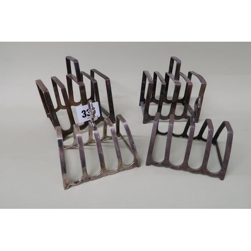 336 - Four hallmarked silver toast racks, two matching pairs, total weight approx 10.3 troy oz