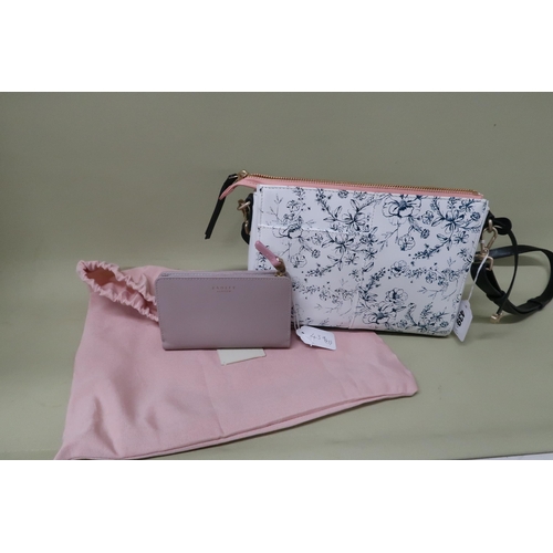 439 - A Radley slim summer handbag, with printed flowers and pale pink leather pocket and shoulder strap, ... 