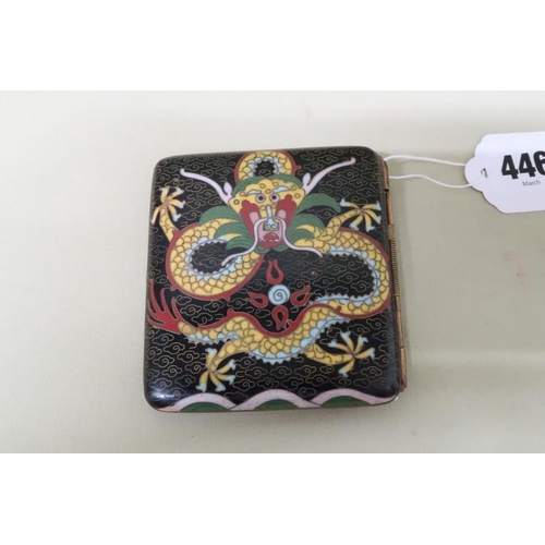 446 - A Chinese cloisonne cigarette case the black cloud ground with yellow dragon chasing the flaming pea... 