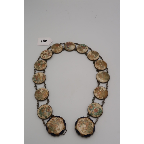 457 - An early 20th century Japanese belt formed from fourteen Satsuma panels of circular form set in whit... 