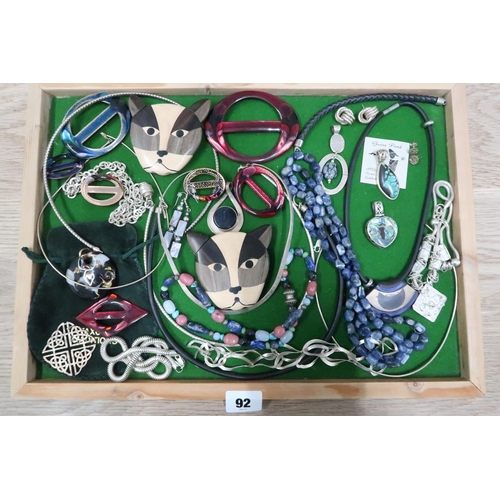 92 - A group of silver, hardstone, glass and enamel costume jewellery including two Mexican silver torque... 