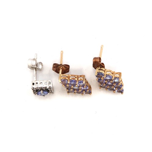 168 - A pair of Mexican 10ct gold earrings set with tanzanites in a diamond pattern, with 10ct gold butter... 