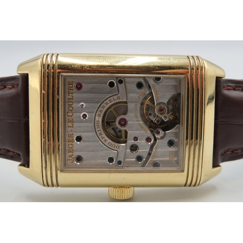 253 - A Jaeger-LeCoultre Reverso XGT Grande Date 18ct gold wristwatch serial number 2168764 with three ser... 