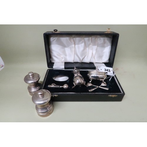 343 - A pair of silver salt and pepper grinders, M C Hersey & Son Ltd, London 1989, each 7cm high, and a m... 