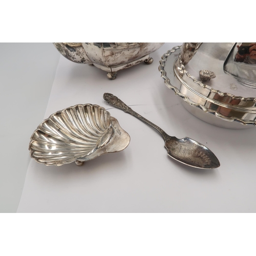 An Art Deco silver teapot, of curvilinear form, pie-crust rim, and ...