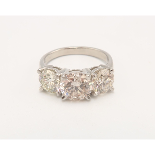 A Platinum 3 Stone Diamond Ring Total Carat Weight 3.62crts, Centre Stone approx. 1.62crt, Diamonds are Well Matched, a Good Colour and Clarity, Colour K, Clarity VS1, Comes with a Current GIE Certificate with a Valuation of £17500
