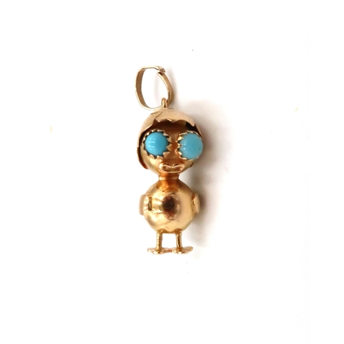 88 - An 18ct gold and turquoise pendant in the form of a chick with an eggshell hat and turquoise set eye... 