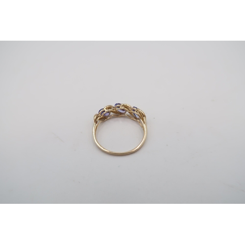 49 - A 9ct Yellow Gold Tanzanite and Diamond Ring, Tanzanites are a Good Colour and Well Matched, Head Si... 