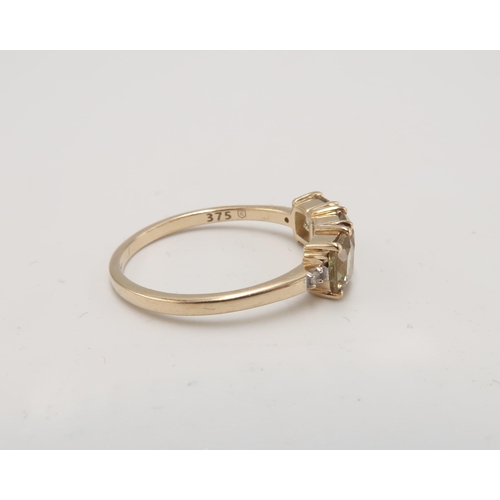 50 - A 9ct Yellow Gold 3 Stone Dispore and Diamond Ring, Head Size approx. 15mm x 6mm - Ring Size approx.... 