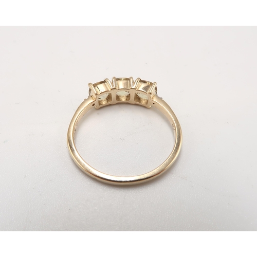 50 - A 9ct Yellow Gold 3 Stone Dispore and Diamond Ring, Head Size approx. 15mm x 6mm - Ring Size approx.... 