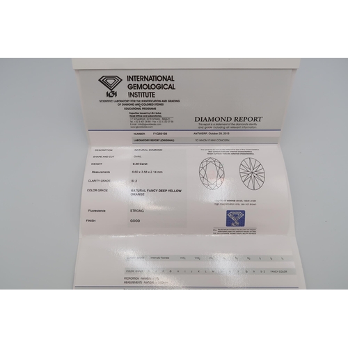 86 - An IGI certificated loose diamond. Oval brilliant. Natural fancy deep yellow orange. SI2. 0.35ct