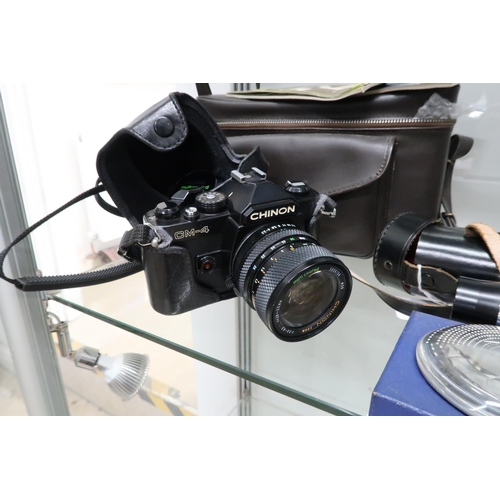 525 - An assortment of vintage cameras and camera accessories to include Chinon CM4, Konica EE Matic, Sang... 