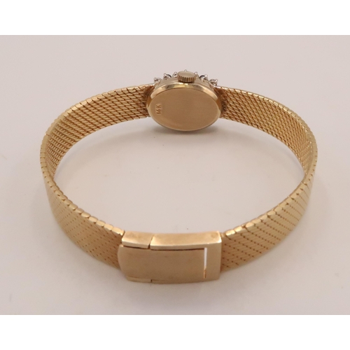 302 - A sapphire and diamond Geneve cocktail watch. Stamped 14K. Weight 30.44 grams.