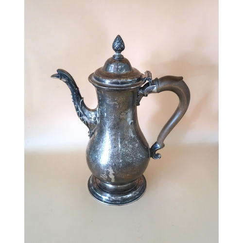 368 - A George III Newcastle silver coffee pot of baluster form with fruitwood handle and pineapple finial... 