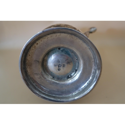 368 - A George III Newcastle silver coffee pot of baluster form with fruitwood handle and pineapple finial... 