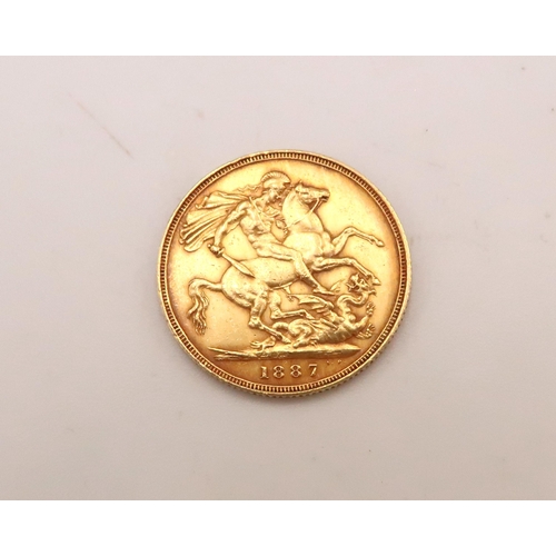 405 - A Full Gold Sovereign of Queen Victoria, 1887 London. 

Weight: 8g 

Condition: Fine, nice toning wi... 