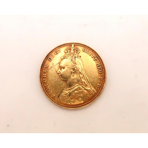 405 - A Full Gold Sovereign of Queen Victoria, 1887 London. 

Weight: 8g 

Condition: Fine, nice toning wi... 