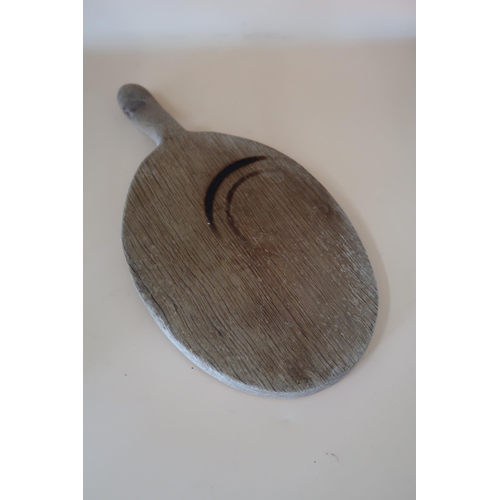 502 - Robert Mouseman Thompson - An oak cheeseboard with carved mouse signature - 37cm x 19cm - used but i... 