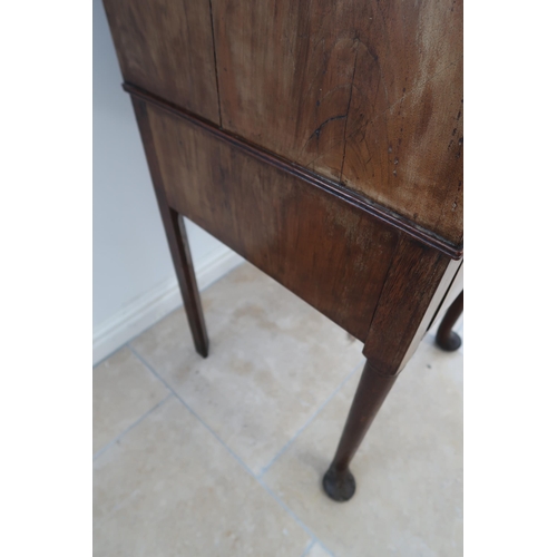 634 - An antique burr walnut bureau and fitted interior over two drawers, 18th century and later, 50cm wid... 